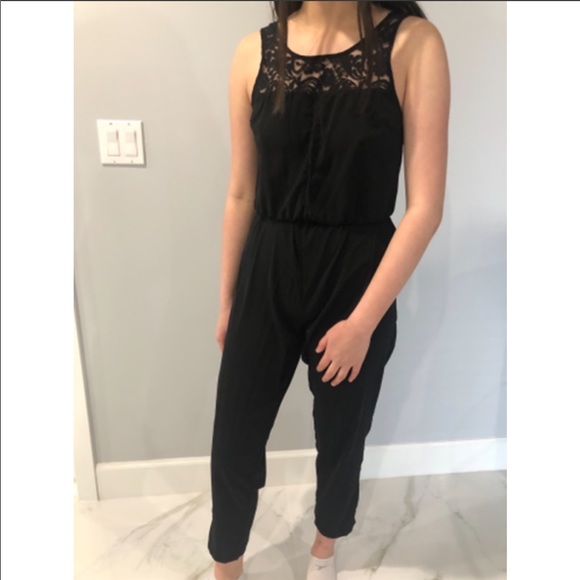 Black Jumpsuit with Lace Details Size: S